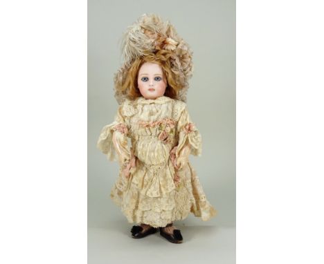 Beautiful early Portrait Jumeau bisque head doll, French circa 1880, the pale bisque head with fixed blue glass spiral eyes, 