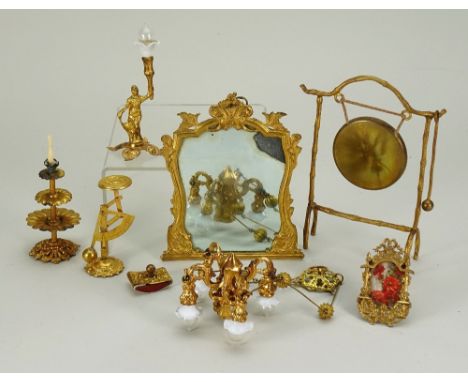 Gilt metal Dolls House miniatures, 1880s, including four branch hanging chandelier, overmantel mirror, 4” (10cm) tall, letter