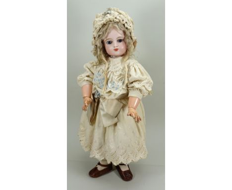 Beautiful and early Eden Bebe bisque head doll, French 1890s, pale bisque head with fixed blue glass paper-weight eyes, finel