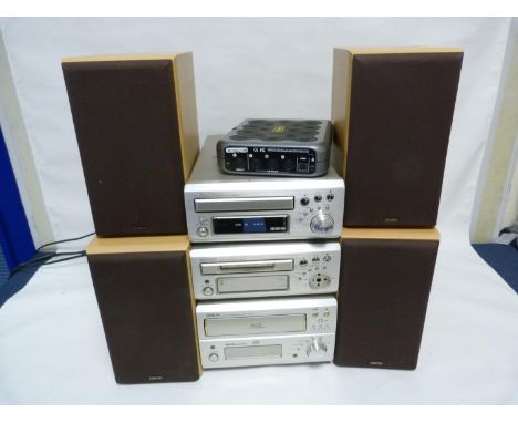 Denon stacking HiFi unit and four speakers, comprising of Cassette deck DRR M31, Mini Disc Recorder DMD M31, CD Autochanger R