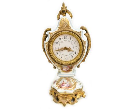 An early 20th century French porcelain hand painted clock, with gilt metal mount surrounding hand painted detail of figures i