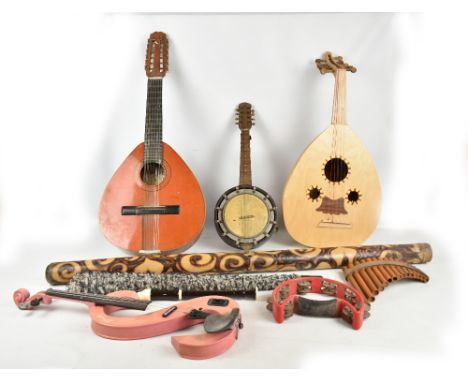 A mixed lot of assorted musical instruments including a modern lute, Spanish folk guitar, banjolin, electric violin, didgerid