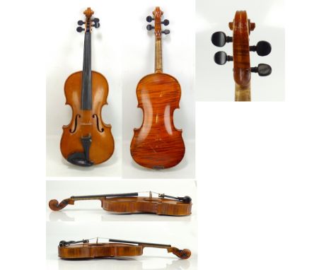 A full size violin with one-piece back, label for Boosey &amp; Hawkes, cased with a bow, length 36cm.Additional InformationTh