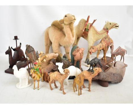 A quantity of camel related items including a large Steiff camel, a reproduction Bergmann figure, masks and various other fig