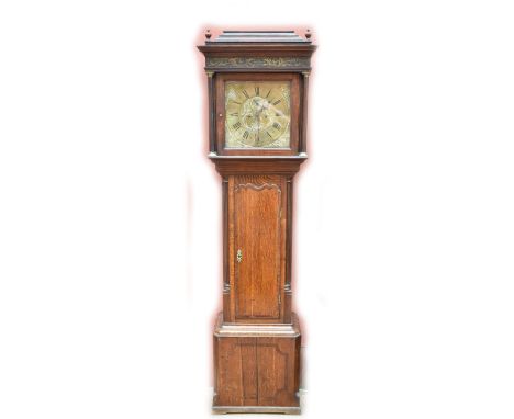 A George III oak cased eight day longcase clock, the brass face set with circular dial with Roman and Arabic numerals and sub