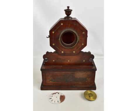A 19th century rosewood mantel clock, the octagonal upper section enclosing enamelled dial set with Roman numerals (af) and m