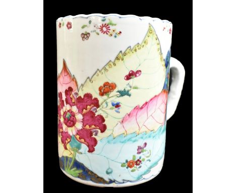 An 18th century Chinese porcelain Famille Rose mug, painted in enamels with floral decoration, height 14cm.Additional Informa