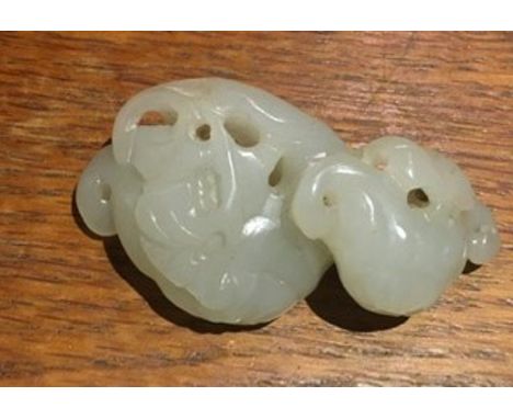 A Chinese pale jade carving of lingzhi sprigs and leaves, unmarked, length 6cm.Additional InformationLight general wear and d