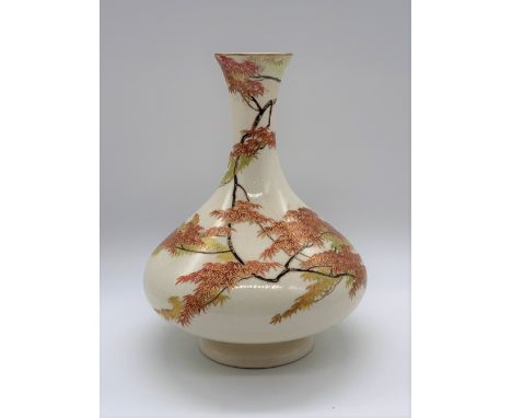 YABU MEIZAN; a Japanese Meiji period Satsuma vase finely decorated with leaves upon branches on a cream ground, signed with p