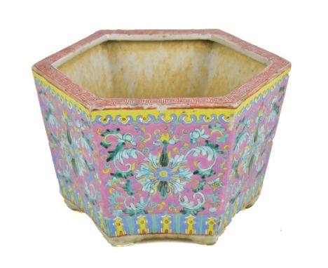 A 20th century Chinese porcelain hexagonal planter with Greek Key border to rim above enamelled foliate decoration, unmarked,