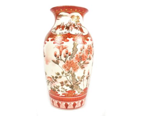 A late 19th/early 20th century Kutani baluster vase with floral decoration throughout, one panel featuring ten elders, with f