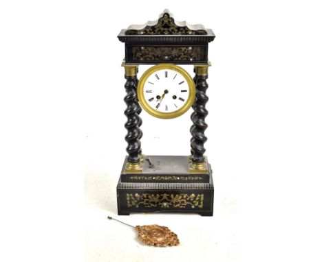 A Victorian ebonised wooden portico clock, with brass inlaid decoration, the circular enamelled dial with Roman numerals, com