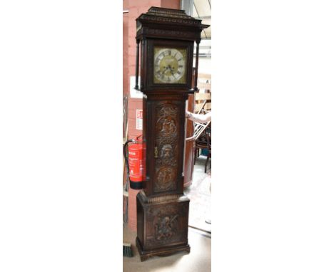 An early 18th century century longcase clock with square brass dial set with silvered chapter ring, name plate and date apert