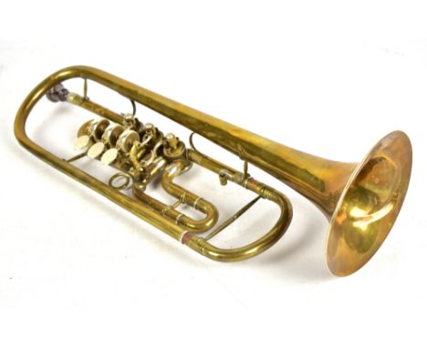 A brass rotary trumpet by Aug. Clemens Glier, Markneukirchen, cased.