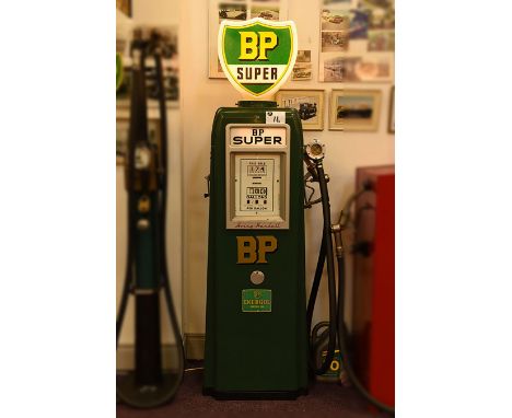 BP Petrol pump c/w glass reproduction globe