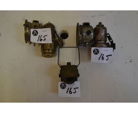 Two Carbide Bicycle lights and one blackout light