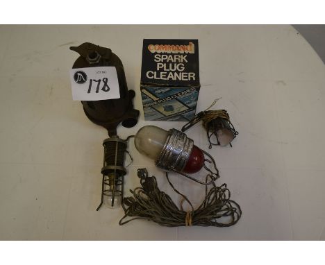 Two spark plug cleaners, two inspection lamps and one red and white light