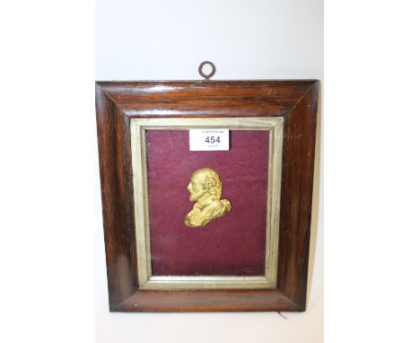 A GILT METAL PORTRAIT OF A GENTLEMAN, in a rosewood frame, W 21.5 cm
