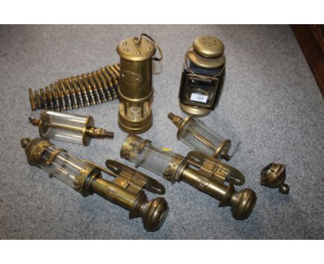 A COLLECTION OF ASSORTED LAMPS ETC TO INCLUDE A MINERS LAMP, PAIR OF BRASS LAMPS STAMPED GWR ETC