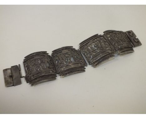 A WHITE METAL PIERCED EGYPTIAN DESIGN BANGLE A/F
