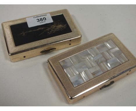 A JAPANESE MUSICAL CIGARETTE BOX TOGETHER WITH A MOTHER OF PEARL EXAMPLE