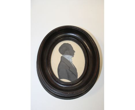 A 19TH CENTURY STYLE PORTRAIT SILHOUETTE OF A GENTLEMAN, framed and glazed, overall H 14 cm