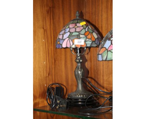 A TIFFANY STYLE LAMP AND SHADE