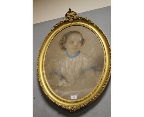 ALEXANDER BLAIKLEY (1816-1903). Scottish school, an oval portrait study of a young girl, in an oval carved wooden decorative 