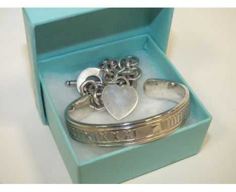 A BOXED SILVER TIFFANY & CO BRACELET TOGETHER WITH A TIFFANY & CO SILVER BANGLE