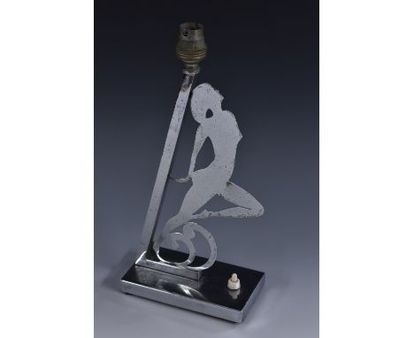 An Art Deco chrome table lamp, applied with a stylised female nude in profile dancing on the crest of a wave or zephyr, 33.5c