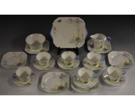 A Shelley regent shape tea set, printed and painted with sunlight amongst slender tall trees, comprising six tea cups, six sa