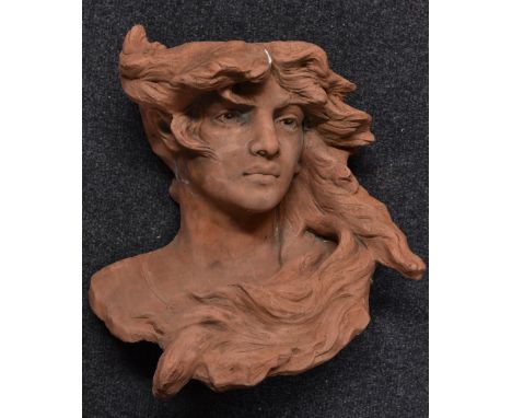 A terracotta wall planter, in the Art Nouveau manner, with a lady with long flowing hair, 36cm high