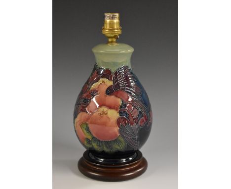 A contemporary Moorcroft Finches pattern baluster lamp base,  tube lined with birds perched amidst pomegranates and berries, 
