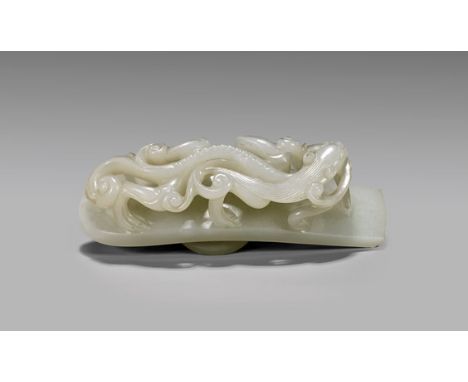 CARVED WHITE JADE BELT HOOKChinese carved white jade belt hook; the large arched form with a writhing chilong in in high open