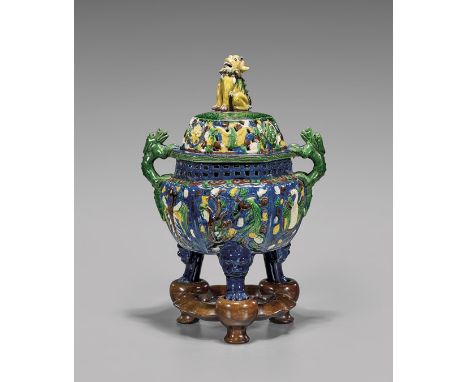 MING-STYLE WUCAI GLAZED TRIPOD CENSERElaborately moulded, antique Chinese Ming-style wucai glazed pottery tripod censer; the 