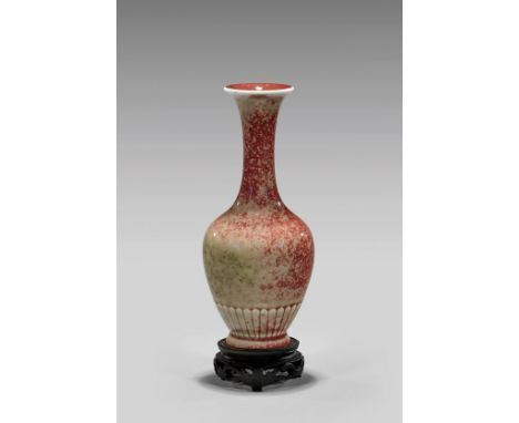 KANGXI PERIOD 'PEACHBLOOM' PORCELAIN VASEChinese Kangxi Mark and of the Period, 'unripened peachbloom' glazed porcelain bottl