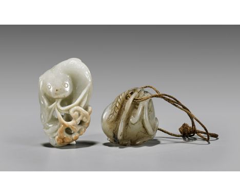 TWO CARVED JADE TOGGLES: Lotus Pod & RuyiTwo Chinese carved jade toggles: of a celadon lotus pod; together with openwork ruyi
