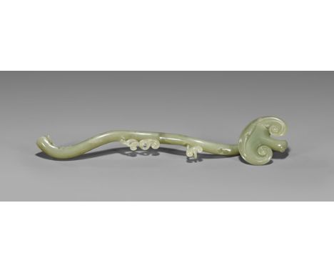 ANTIQUE CARVED JADE RUYI SCEPTERWell carved, antique Chinese jade ruyi scepter; of naturalistic form with fungus head, the sh
