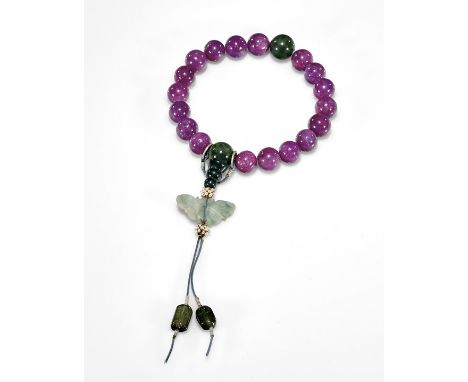 CHINESE RUBY, JADE & TOURMALINE BRACELETChinese bead Buddhist bead bracelet; comprised of 18 ruby matrix round beads of appro