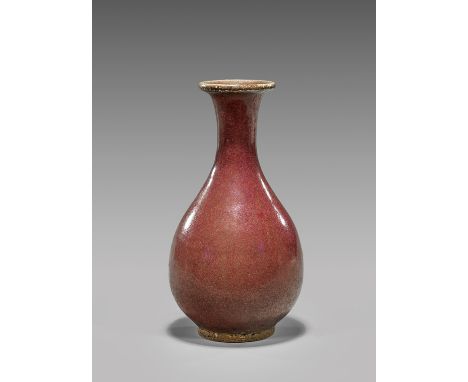 ANTIQUE CHINESE FLAMBÉ GLAZED VASEAntique Chinese flambé glazed porcelain vase; of footed bottle form and flared rim, with fa