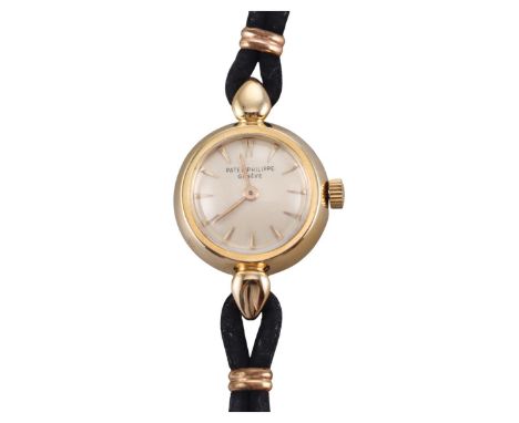  Metal : 18k Yellow Gold   Designer  : Patek Philippe   Movement  : Manual 18j   Measurements  : 17mm case diameter   Referen