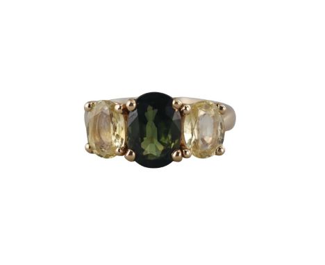  Metal  : 14k Gold   Designer  : Not Signed   Gemstone  : Green tourmaline, yellow sapphires.   Measurements  : Ring size 6.2