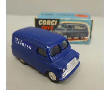 A Corgi Toys no.403 12cwt Delivery Van comprising of dark blue body with flat spun hubs and Daily Express livery, in original