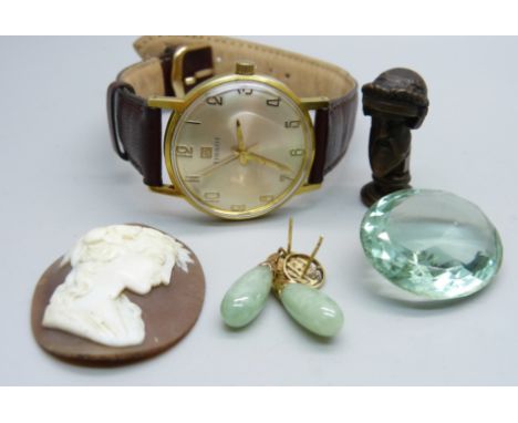 A Tissot wristwatch, a pair of jade earrings, etc. 