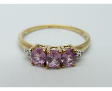 A 9ct gold Burmese pink spinel and zircon ring, 1.9g, U 