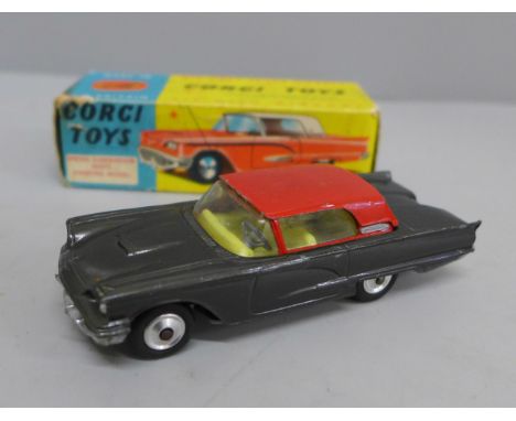 A Corgi Toys no.214S Ford Thunderbird, hard top metallic grey body with red roof and lemon interior, with spring suspension, 