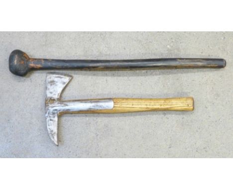 A WWI period fireman's axe, marked Gilpin, and an African fighting stick 