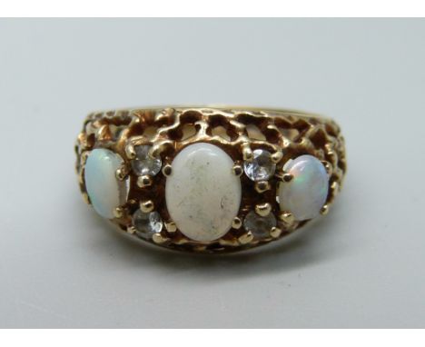 A 9ct gold, opal and white stone ring, 3.2g, L, one opal a/f 