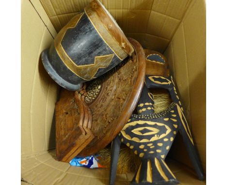 A collection of African masks, a wooden drum with animal skin top, an Indian table, etc. **PLEASE NOTE THIS LOT IS NOT ELIGIB