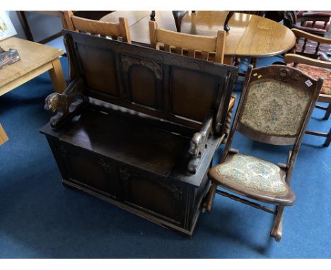 An oak Monk's bench and a rocking chair